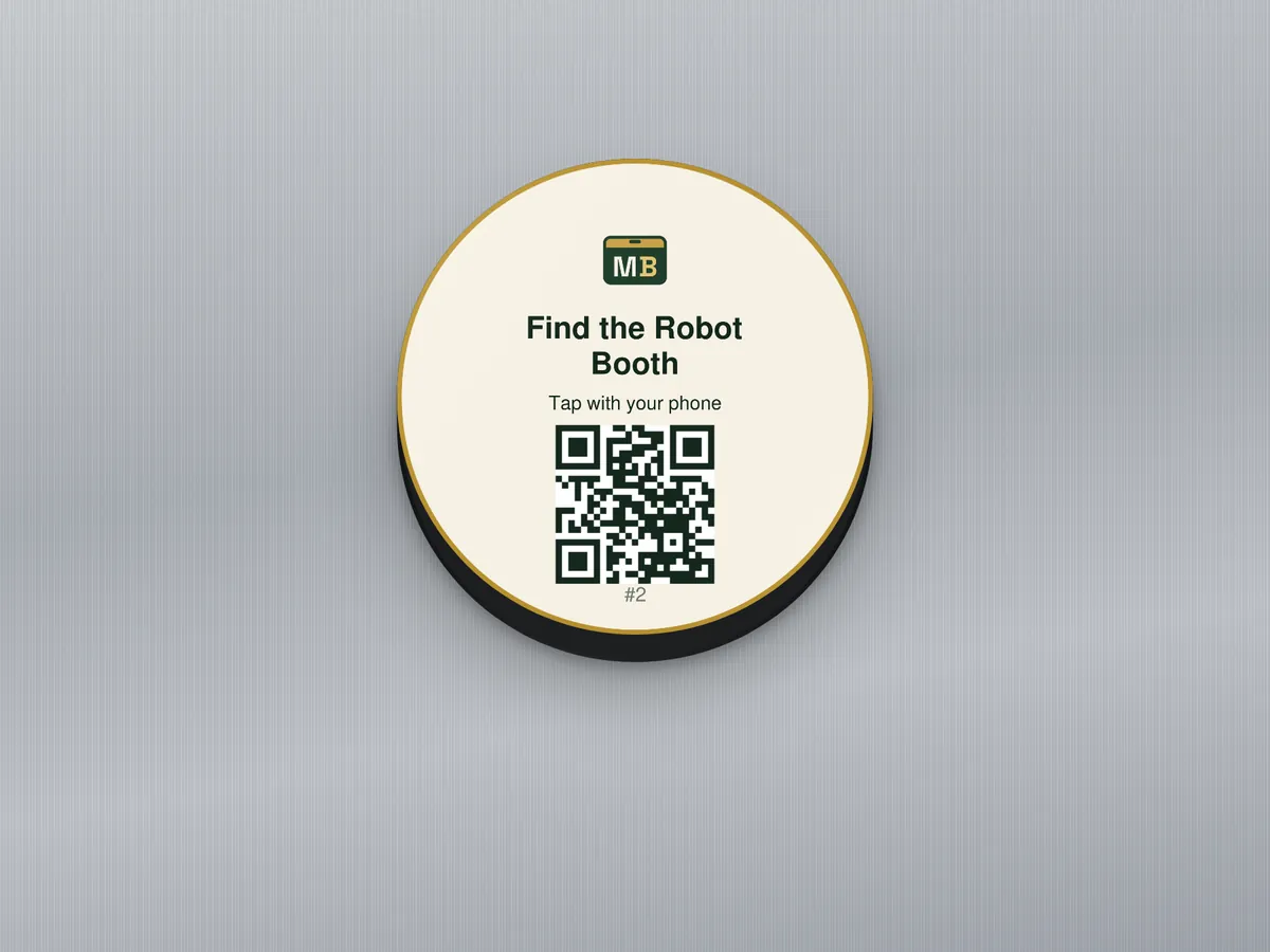 Metal-safe Quest Sticker: the same cream and gold quest label, here "Find the Robot Booth", on a black on-metal disc against brushed aluminium